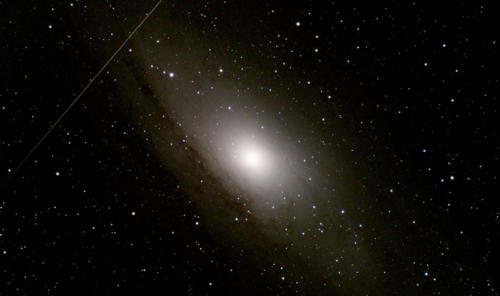 Andromeda Galaxy center and meteor